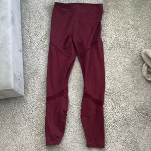 Dark red pants, no stains or rips.